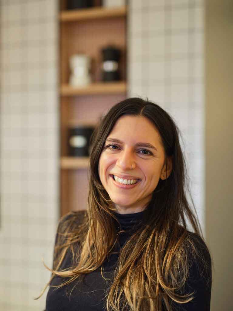 Interior Designer Johanna Endres-Castillo, founder of Speaking of Interiors, at a coffee she designed in London